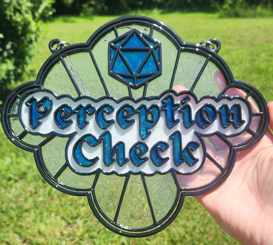 A faux stained glass piece of a blue 20-sided die icon at the top and the words 'Perception Check' in blue lettering on a white background.